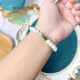 Vòng tay đá Cẩm Thạch bạch ngọc size hạt 7.7 li phối charm lu thống Ngọc cẩm thạch bọc xi vàng cao cấp | Hoa Minh Gem. 